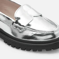 Girl moccasins in glazed leather